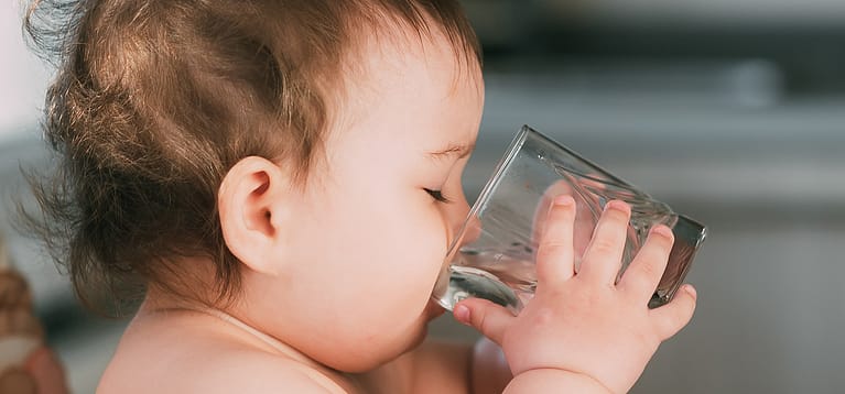 How much water does a baby need in a day month wise?