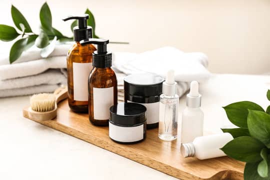 A collection of sustainable personal care products with natural ingredients, reflecting 2023's commitment to eco-friendly and non-toxic self-care.
